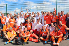 Cllr Salih Gaygusuz, St Albans Mayor (centre), with the England 055’s team who are the O55's European Champions 2015, with their Dutch opponents who they beat in the final. On the Mayor’s right, holding the trophy cup aloft, is the England captain, Mark Precious.