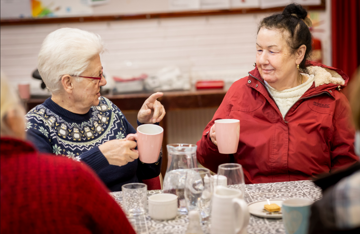 Older people enjoying a cup of tea