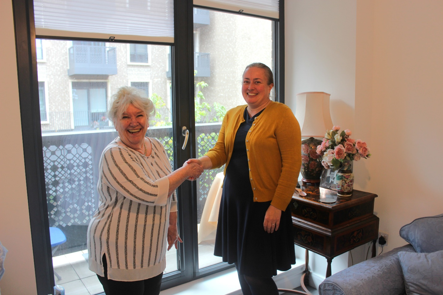 Cllr Jacqui Taylor, right, meets with Jubilee Square tenant Sheila Dawson-Papa.