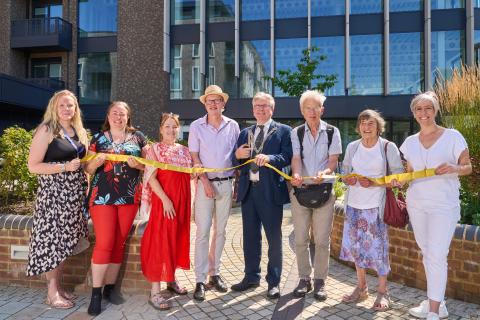 Representatives from the Council, including the Leader Cllr Paul de Kort, and the Quakers, with Local MP Daisy Cooper