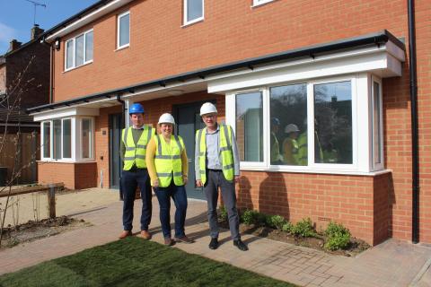 Cllr Taylor, centre, at The Hedges development